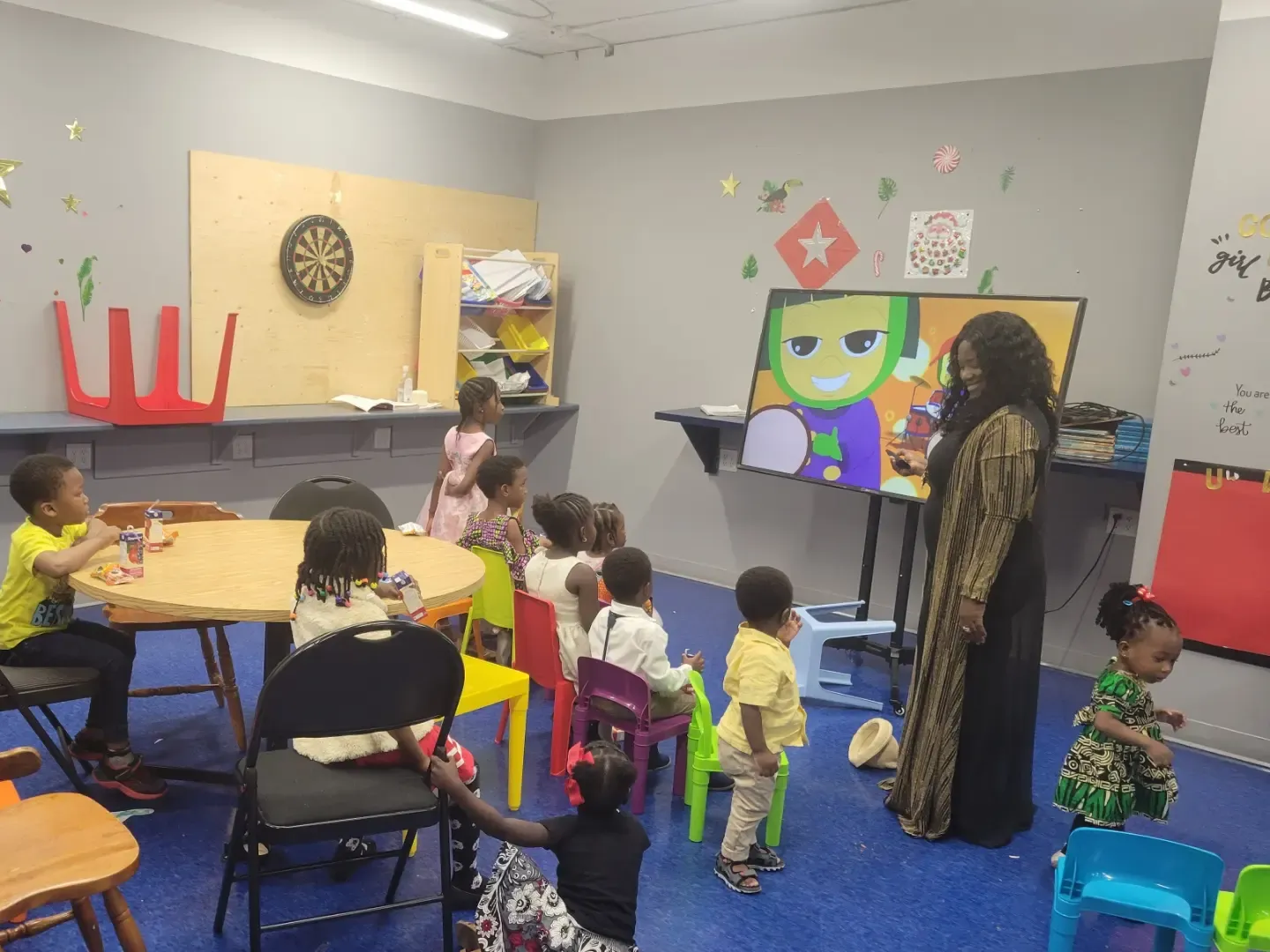 Children playing and learning in the children's church room