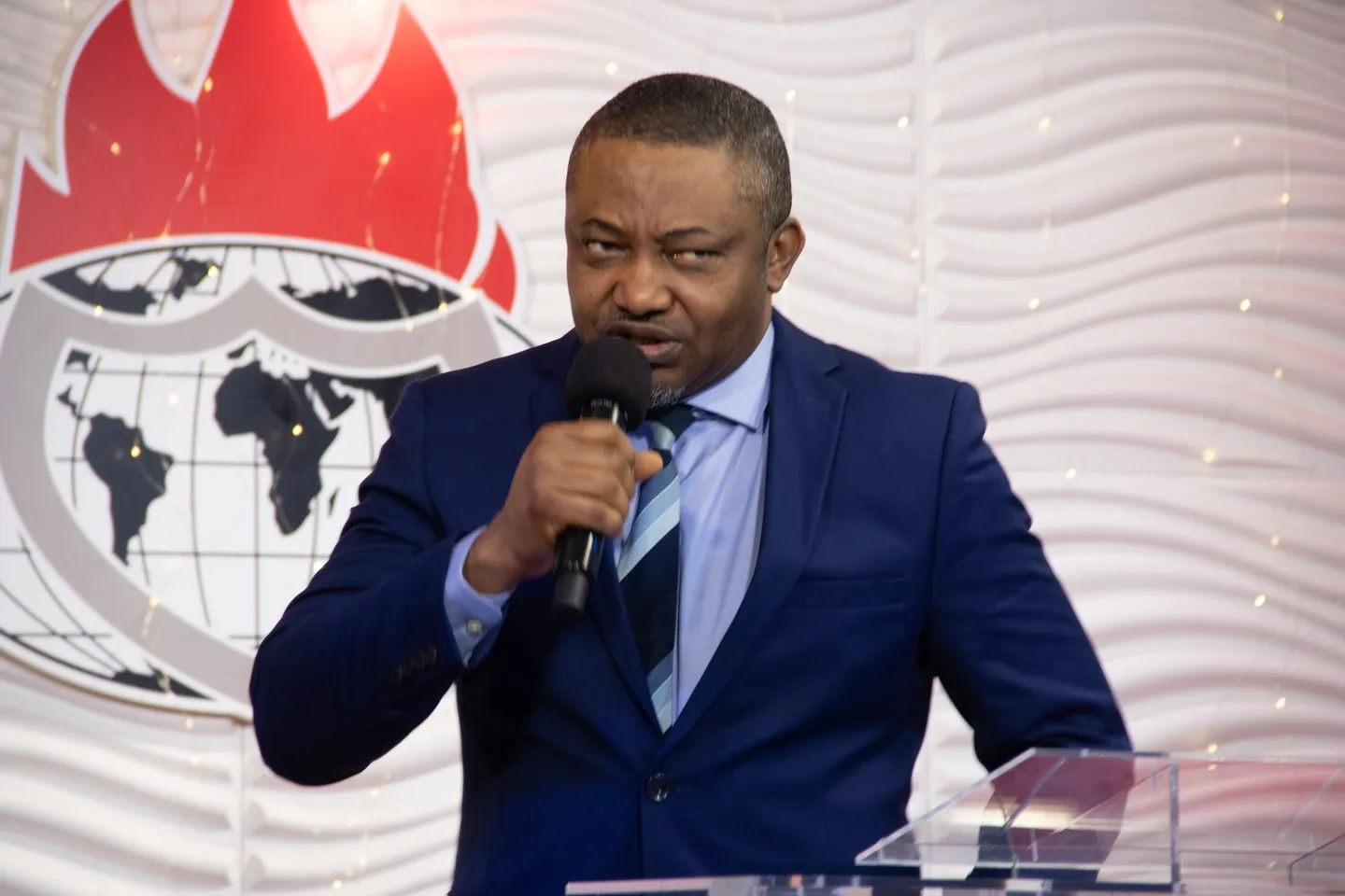 A minister preaching at the pulpit